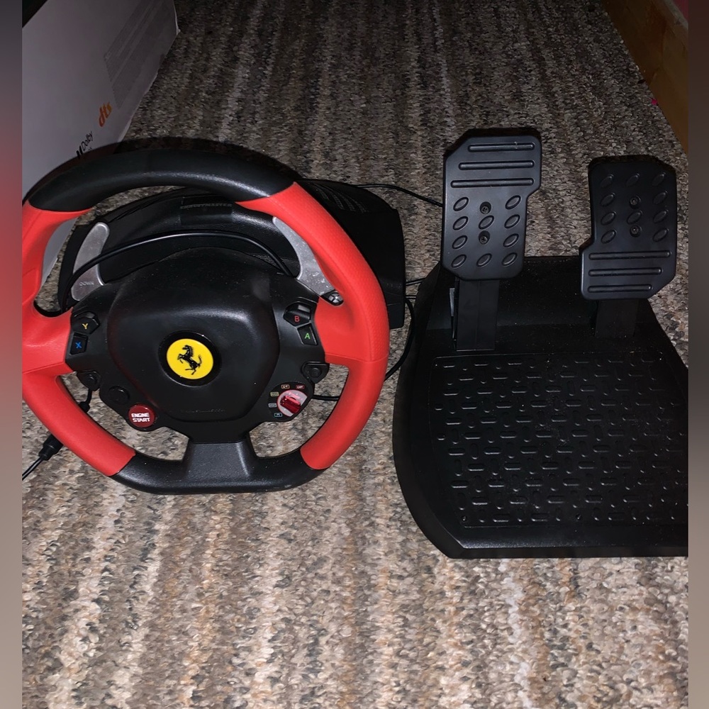 Thrustmaster Ferrari reaching wheel and pedals